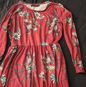 Large maroon and floral dress has pockets